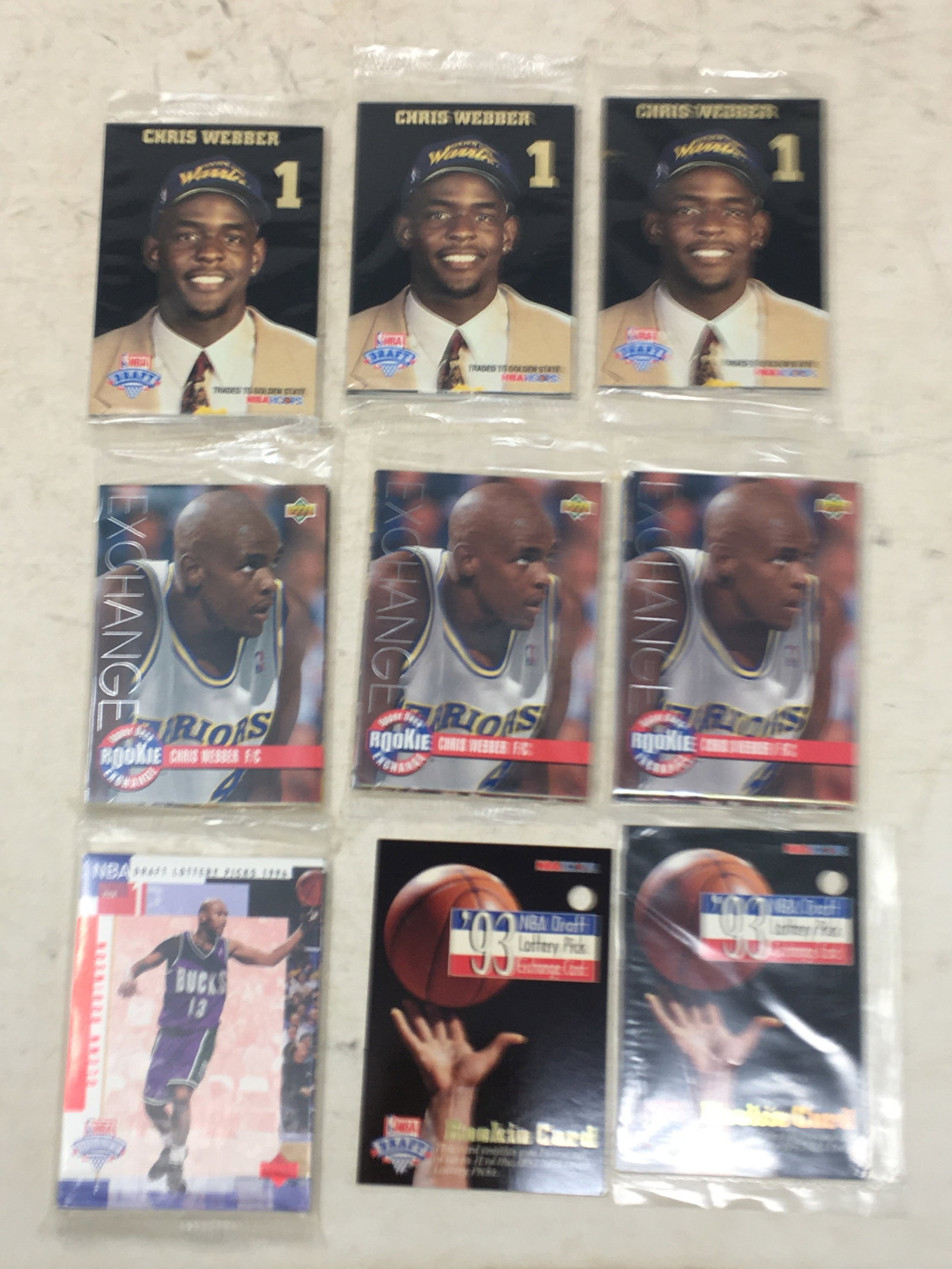 1994 Skybox NBA Hoops Draft Sets, 1994 Upper Deck Rookie Exchange Sets: (3) 1994 Skybox NBA Hoops 1993 Draft Sets, Chris Webber, 11-card sets, factory sealed. (1) '93 NBA Draft Lottery Pick Exchange Card, reverse filled out; (3) 1993-94 Upper Deck Rookie Exchange Sets, Ch