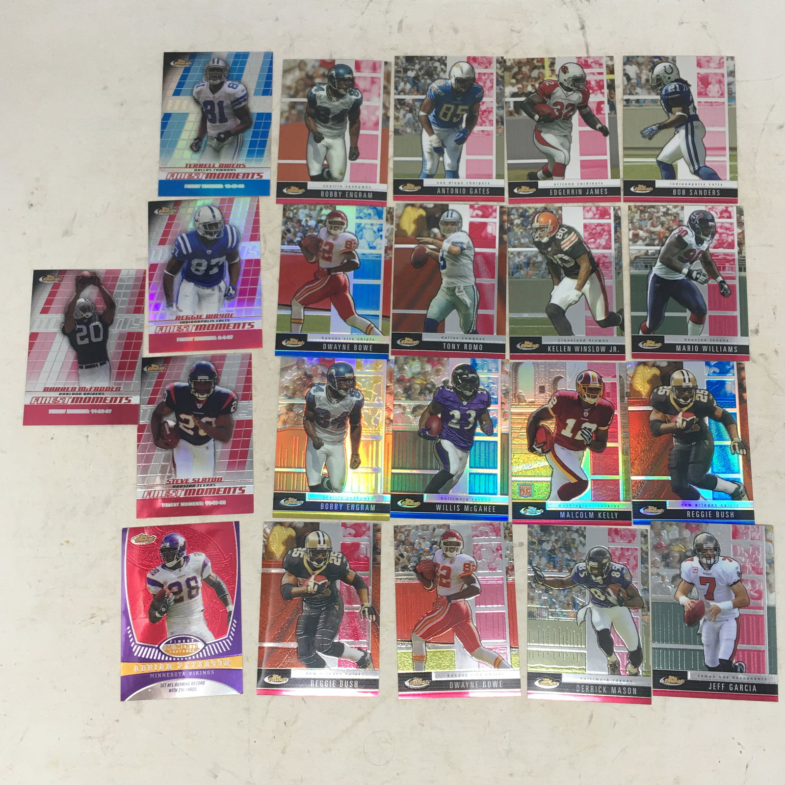(21) 2008 Topps Finest Football Cards: (21) 2008 Topps Finest Football Cards, Incl. Bobby Engram Gold Refractor #67, 48/50, and other refractors. Finest Moments Terrell Owens FM-TO Blue Refractor, # 043/299; Adrian Peterson 152/629; Reggie