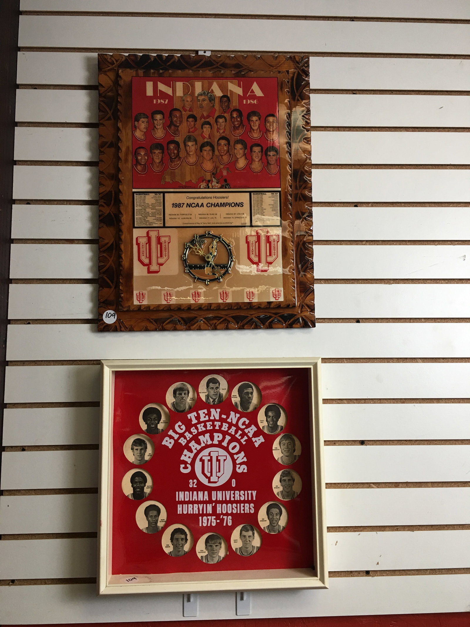 Indiana University NCAA Basketball Champions, 1976 & 1987 Plaque/Clock: Indiana University Hoosiers NCAA Basketball Champions, 1976 display with player photos 15.5"x15.5"; 1987 plaque/clock with player photos and team schedule. "Compliments of Ray & Terry Self, Mid-Americ