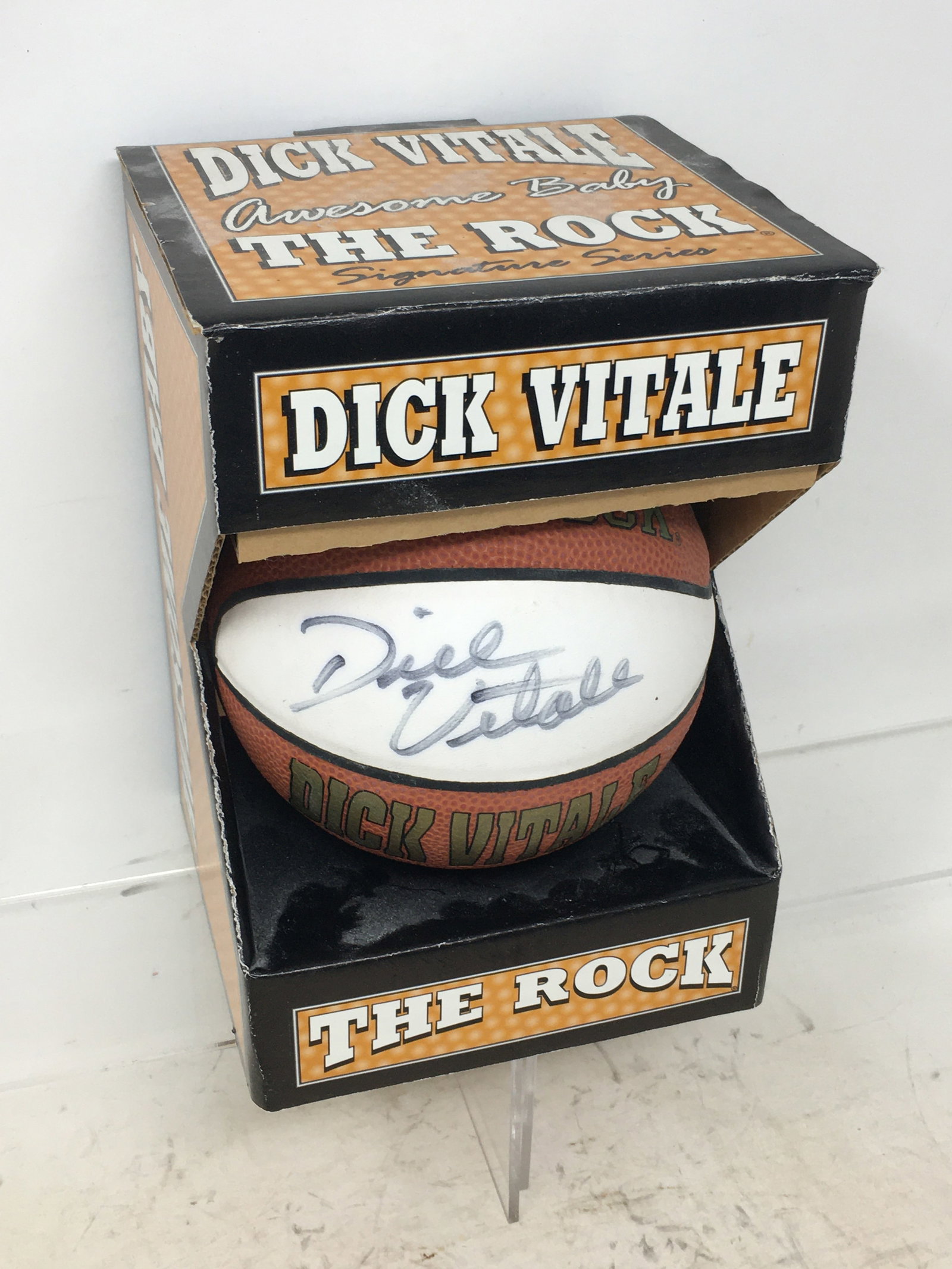 Dick Vitale Autographed Miniature Basketball: Dick Vitale Autographed Miniature Basketball, Awesome Baby, The Rock Signature Series 5" Ball. Signed, "George, Go Irish, Dick Vitale". In box, tagged from Notre Dame bookstore.