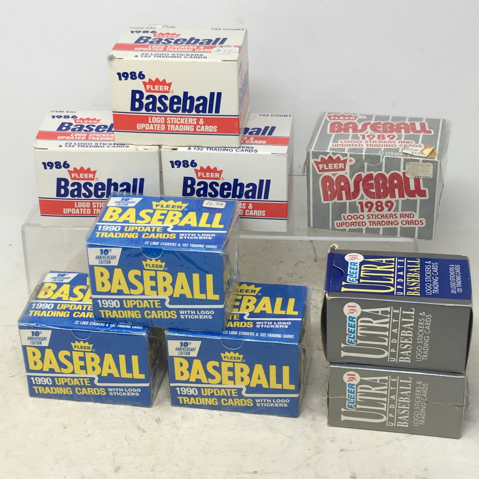 Fleer 1986, 1989, 1990, Fleer Ultra 91 Baseball Update Trading Cards: Fleer 1986, 1989, 1990, Fleer Ultra 91 Baseball Update Trading Cards. (9) boxes. '86, (3) '90 and one '91 is factory sealed. (1) '91 is partial.