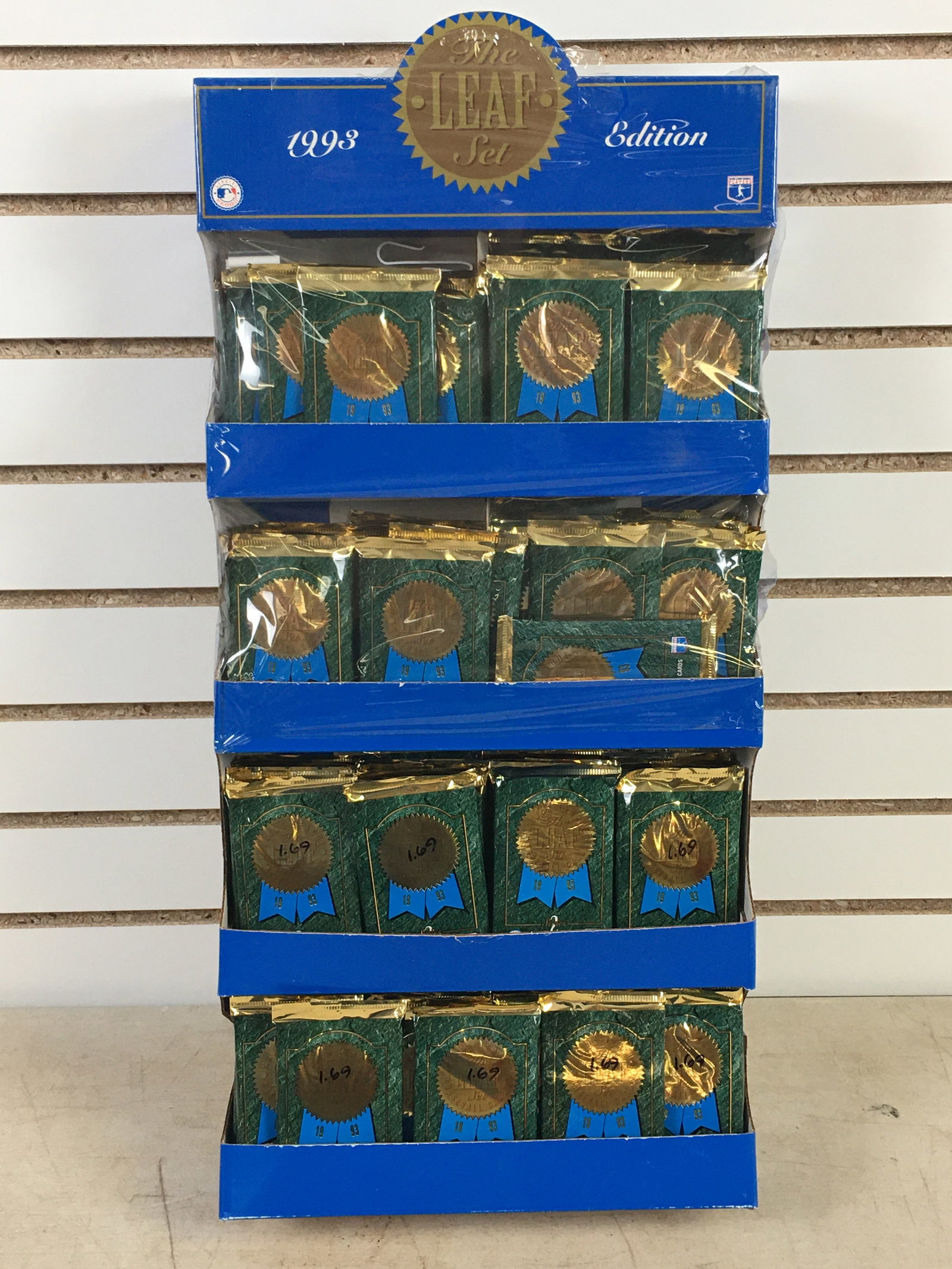 The Leaf Set, 1993 Edition, Baseball Card Packs & Store Display: The Leaf Set, 1993 Edition, Baseball Card Packs & Cardboard Store Display. Still partially factory sealed. 130+ sealed packs.