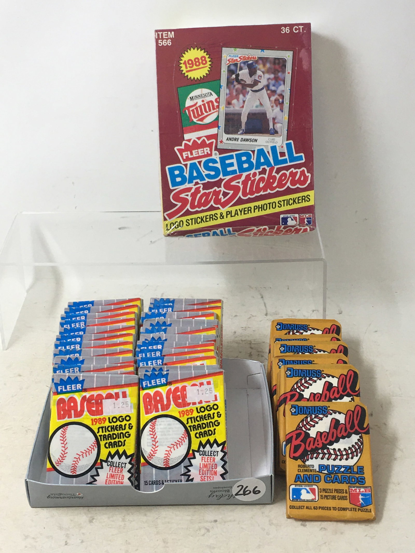 1988 Fleer Star Stickers, Sealed; (26) Wax Packs 1989 Fleer Baseball Cards: 1) 1988 Fleer Star Stickers, Sealed Box, 36 Count; 2) (26) Sealed Wax Packs 1989 Fleer Logo Stickers & Trading Cards; 3) (7) Sealed Wax Packs 1987 Donruss Puzzle & Cards