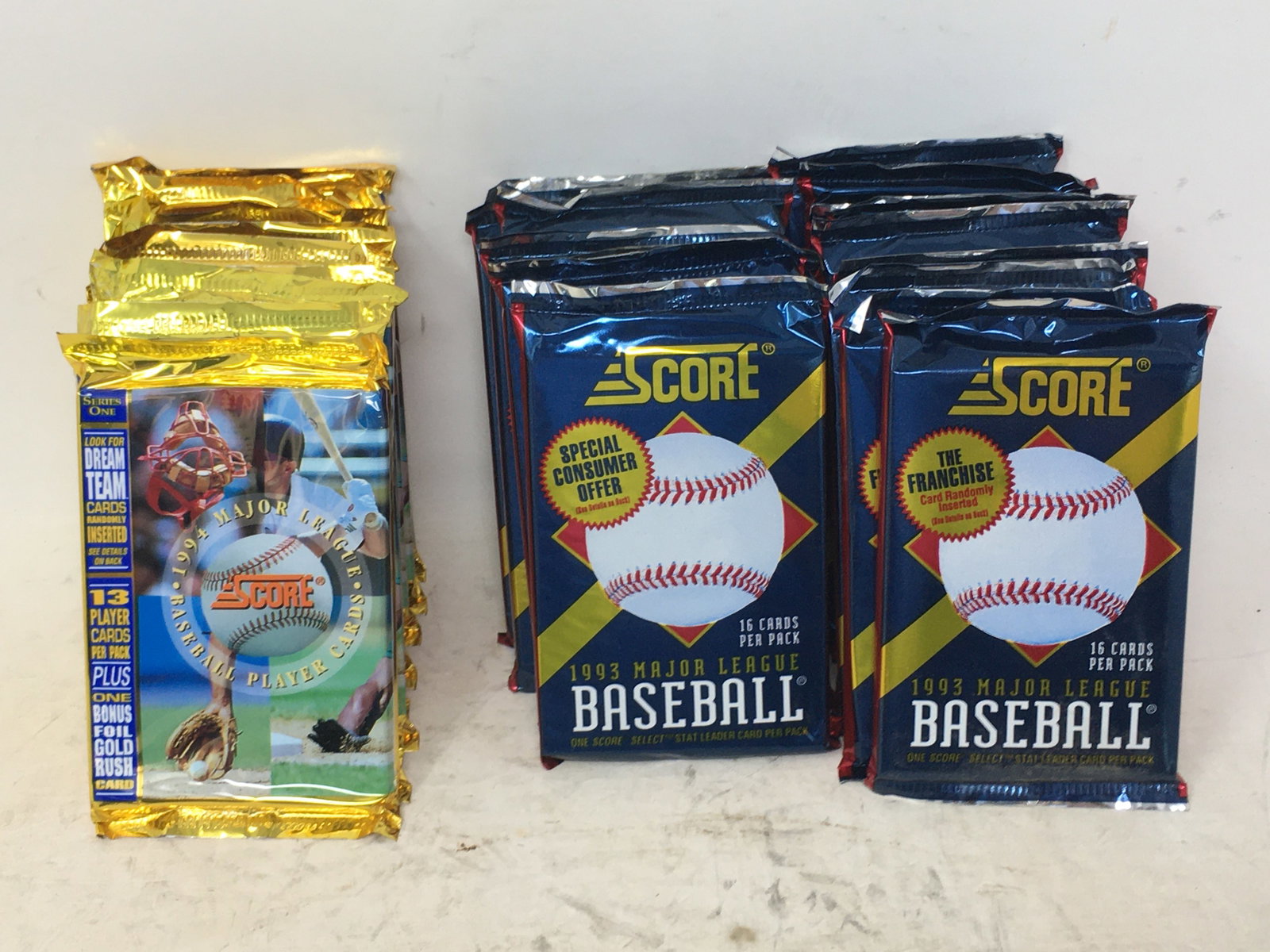 (25) 1993 & 1994 Score Baseball Card Foil Packs: (25) 1993 & 1994 Score Baseball Card Foil Packs. (16) 1993, 16 cards/pack; (9) 1994 Series 1, 13 cards/pack. Unopened