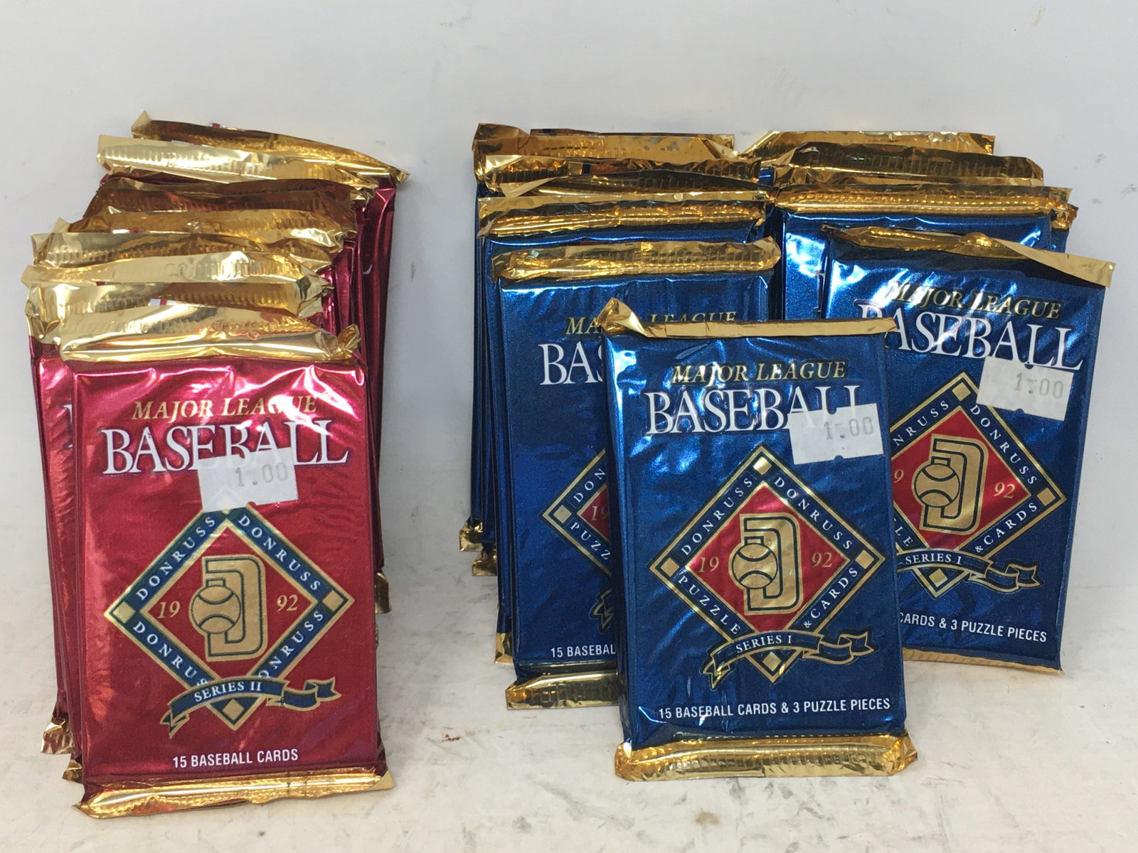 (23) 1992 Donruss Series 1 & 2 Baseball Card Foil Packs: (23) 1992 Donruss Baseball Card Foil Packs; (14) Series 1; (9) Series 2. Unopened. (15) cards/pack. Series 1 also has (3) puzzle pieces.
