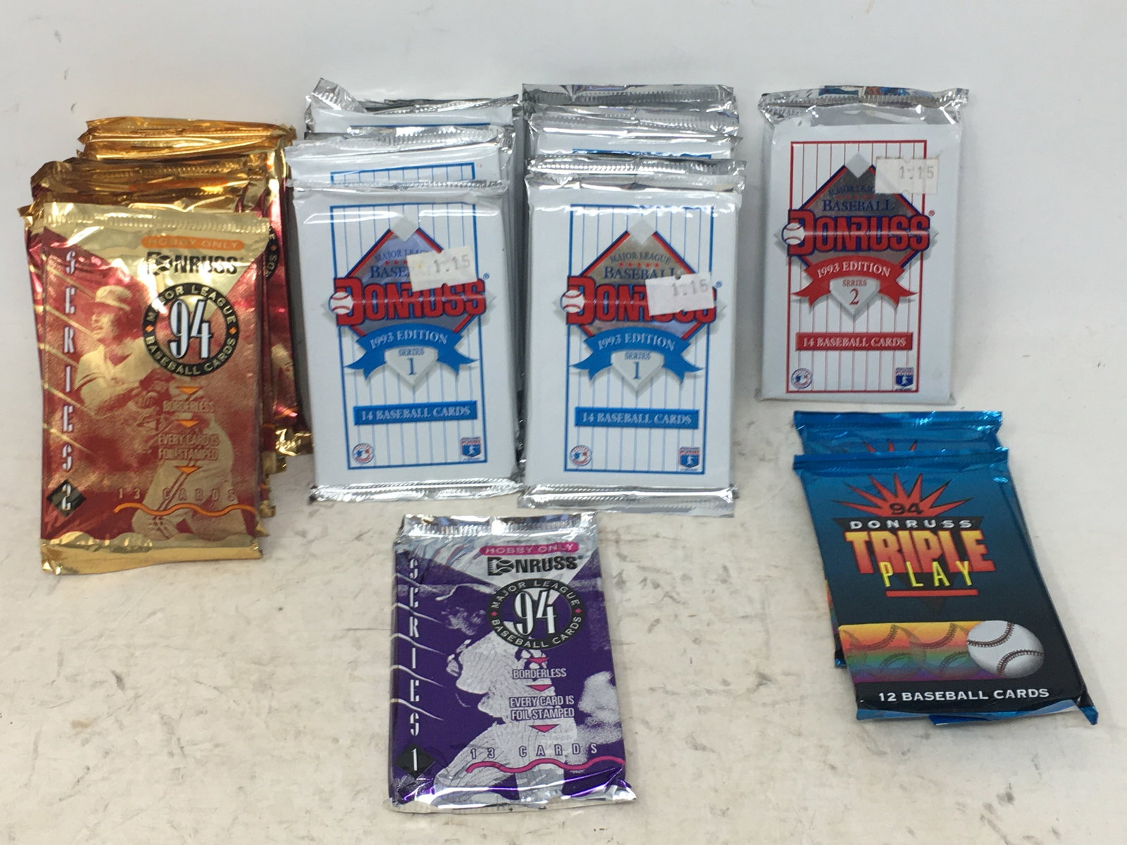 (28)1990s Donruss Baseball Card Foil Packs: (28) Donruss Baseball Card Foil Packs. (16) 1993 Series 2, 14 cards/pack; (9) 1994 Series 2, 13 cards/pack; (1) 1994 Series 1, 13 cards/pack; (2) 1994 Triple Play, 12 cards/pack