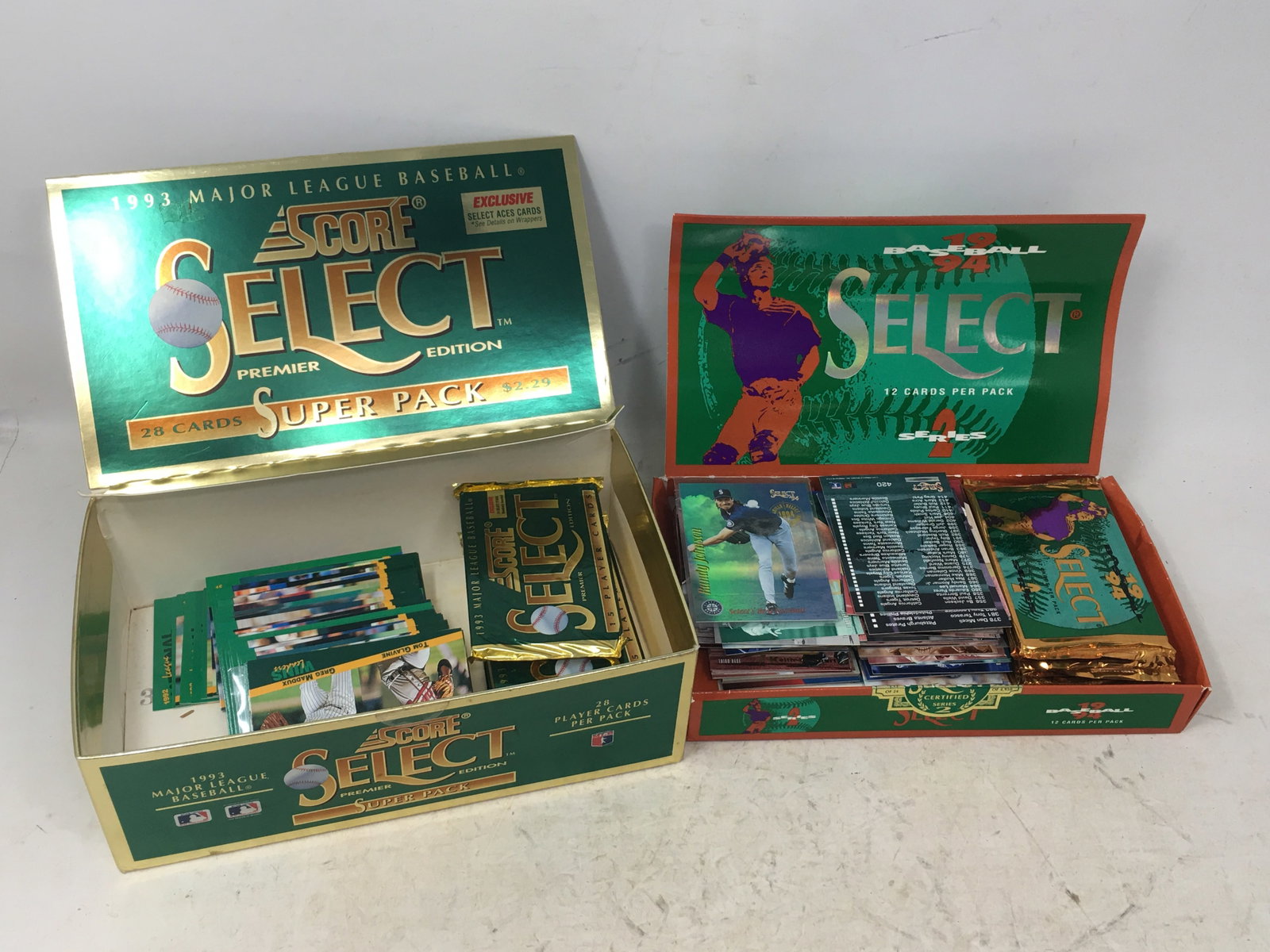 1993 & 1994 Score Select Baseball Cards: 1993 & 1994 Score Select Baseball Cards. 1993 Score Select Premier Edition, (7) sealed packs w/ box, + loose cards; 1994 Select, 7 sealed packs w/ box, + loose cards.