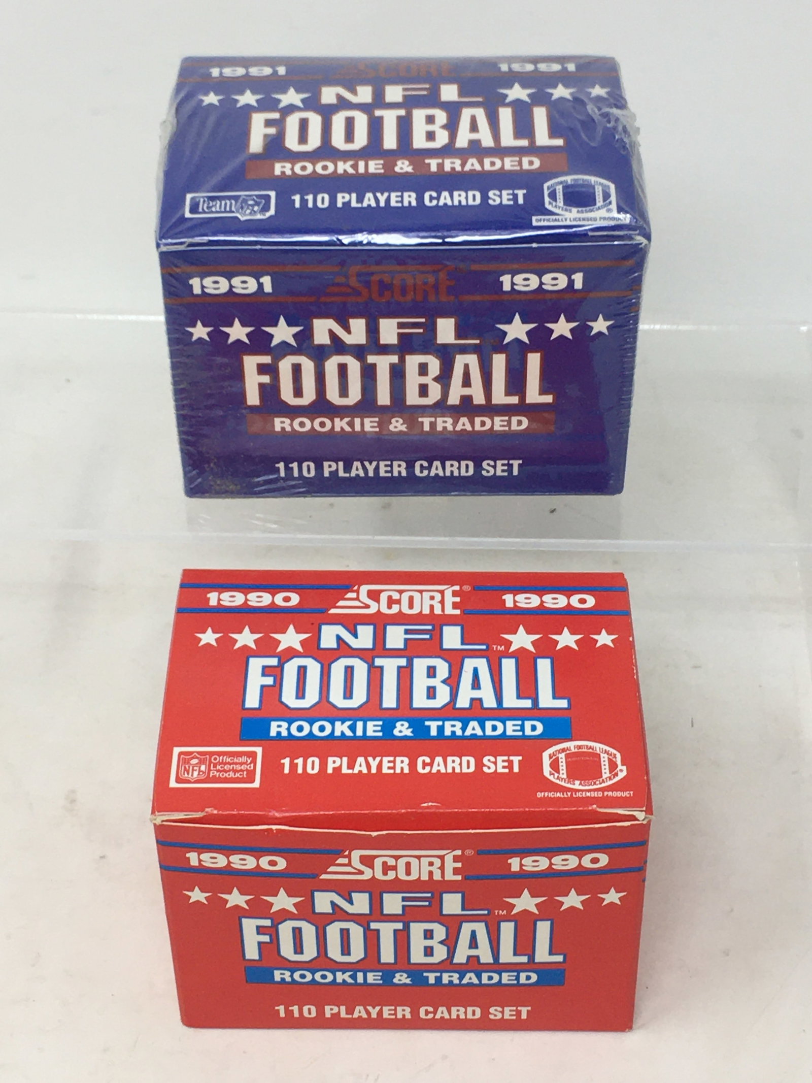 Score Football Rookie & Traded Card Sets, 1990 & 1991: Score Football Rookie & Traded 110-Card Sets, 1990 & 1991. Emmitt Smith rookie. 1991 is sealed.