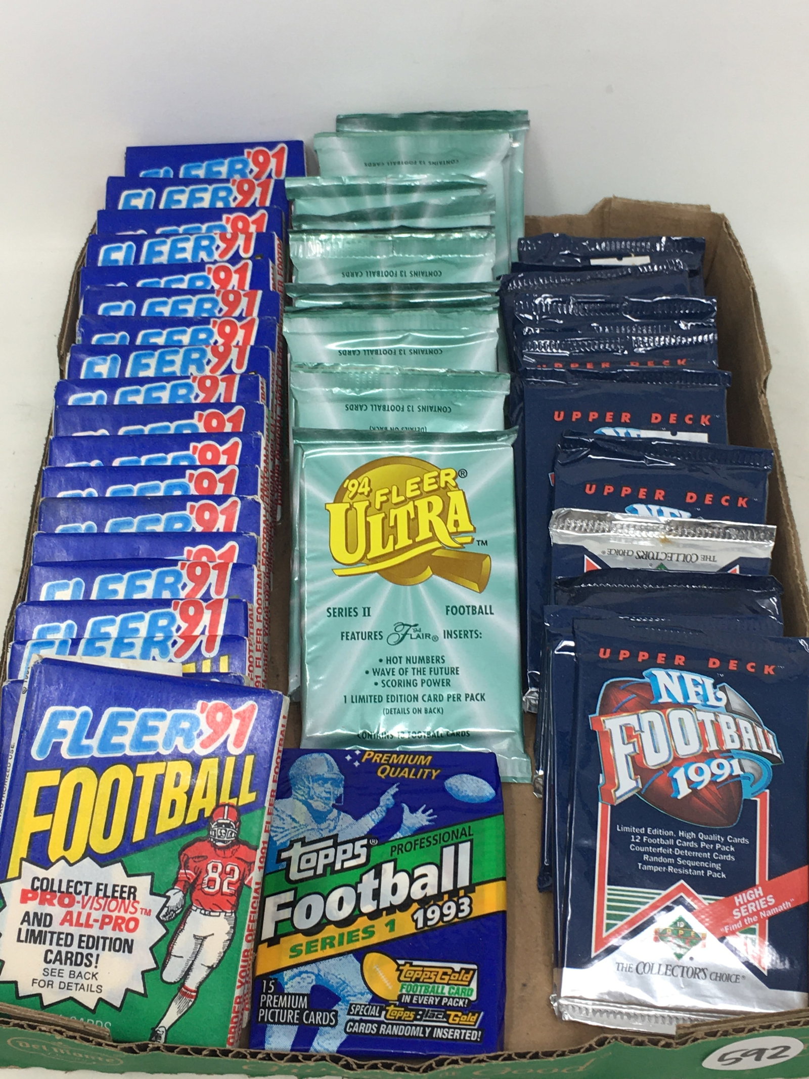 (49) 1990s Football Card Packs, Sealed (1 of 1)