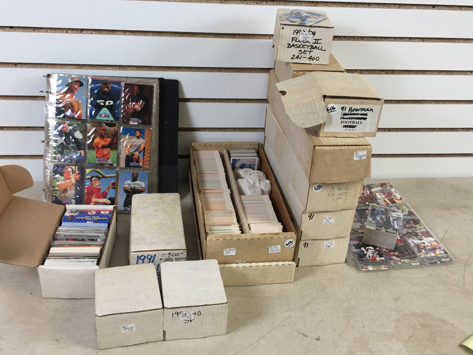 Large Group of 1990s Football Cards: Large Group of 1990s Football Cards. Incl. (3) Pacific 1991 sets, #1-550 + singles; 1992 Pacific; 1991 Pinnacle; few Skybox '92, '93, '94; few Bowman 1991 w/ (4) '92 foils incl. Barry Sanders; '93 & '