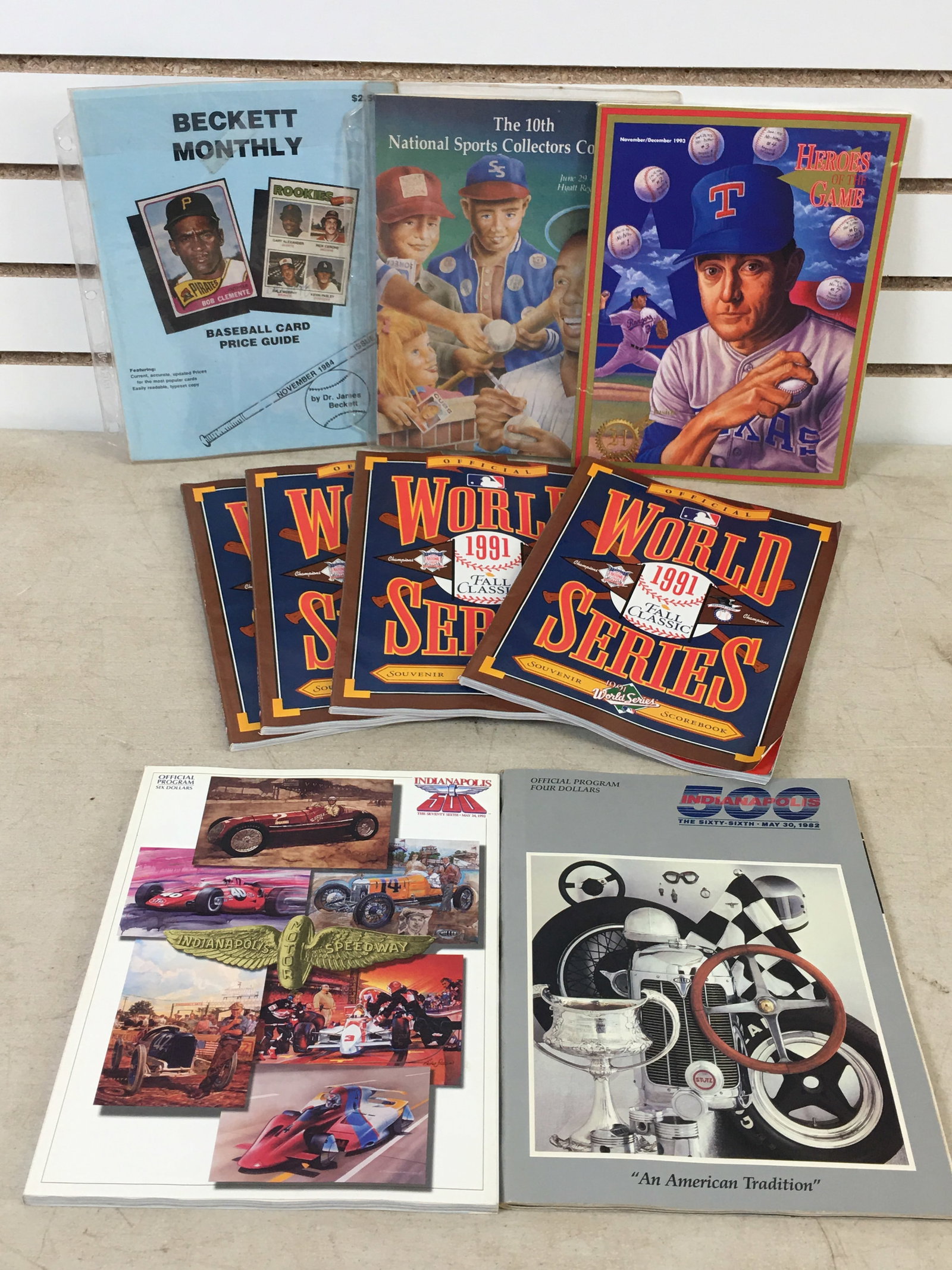 (8) 1990s MLB Scorebooks/Magazines, Indianapolis 500 Programs: (8) 1990s MLB Scorebooks/Magazines, Indianapolis 500 Program. Incl. (4) 1991 World Series Souvenir Scorebooks; 1982 & 1992 Indy 500 program; 1992 Heroes of the Game Magazine; 1984 Beckett Monthly Base