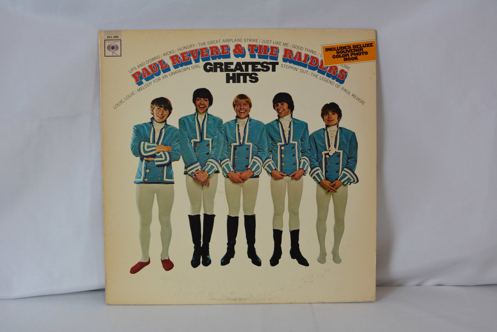 Paul Revere & the Raiders - Greatest Hits Vinyl LP: Classic compilation album from Paul Revere & the Raiders featuring favorites including Kicks, Hungry, Good Thing, Just Like Me, and Steppin Out. Includes original Deluxe Souvenir Color Photo Book call