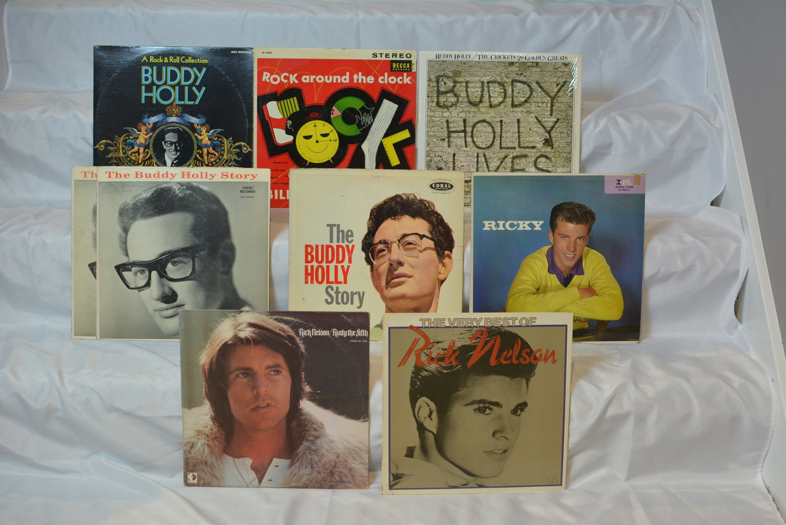 Buddy Holly & Rick Nelson Vintage Vinyl Collection Early Rock & Roll Classics: Vintage early rock-and-roll vinyl collection featuring classic albums from Buddy Holly, Rick Nelson, and Bill Haley. Strong grouping of foundational 1950s?1960s rock icons, including multiple Buddy Ho