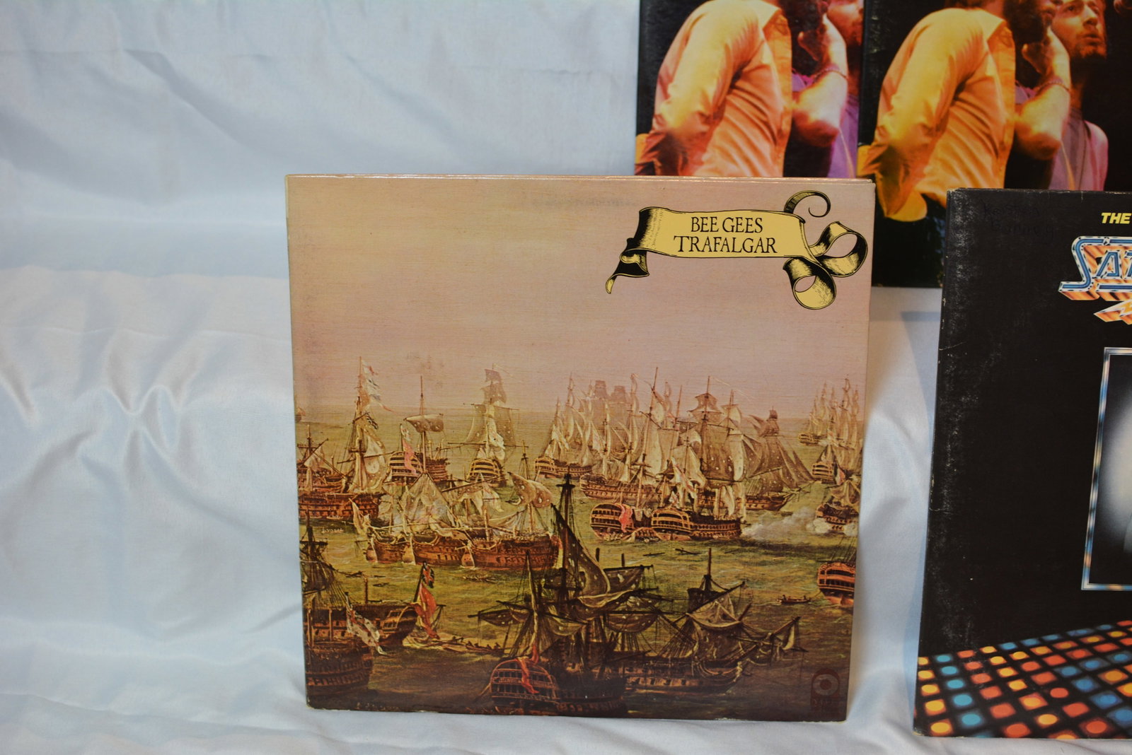 Bee Gees Vintage Vinyl Collection Classic Albums & Iconic Soundtracks: Vintage Bee Gees vinyl record collection featuring classic studio albums, live recordings, and iconic soundtrack releases. Includes several of the groups most recognizable and collectible titles spann