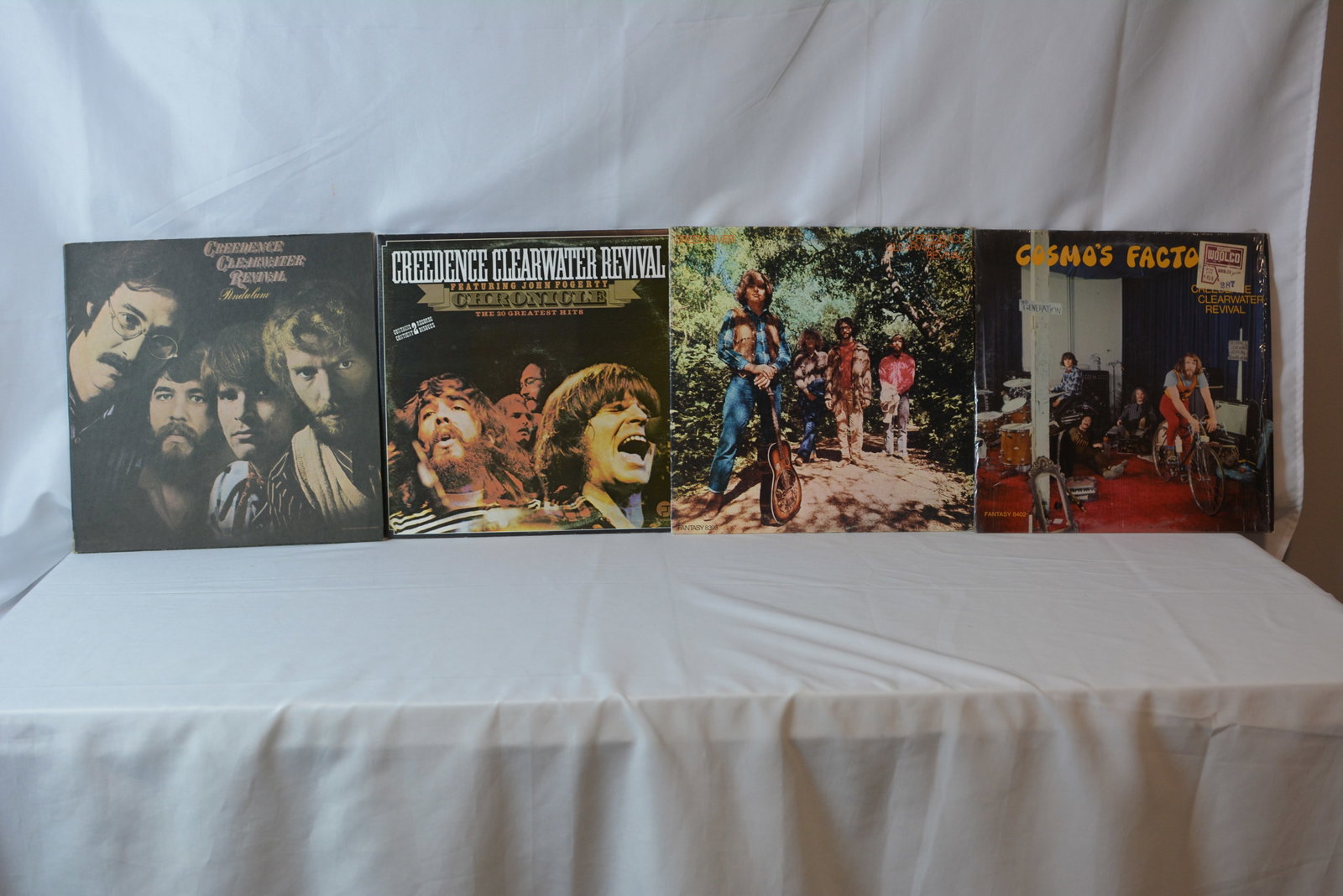 Creedence Clearwater Revival Vinyl LP Lot Pendulum, Cosmo's Factory, Chronicle: Vintage Creedence Clearwater Revival vinyl collection featuring several classic CCR albums including studio releases and a greatest hits compilation. Great classic rock lot with iconic John Fogerty-er
