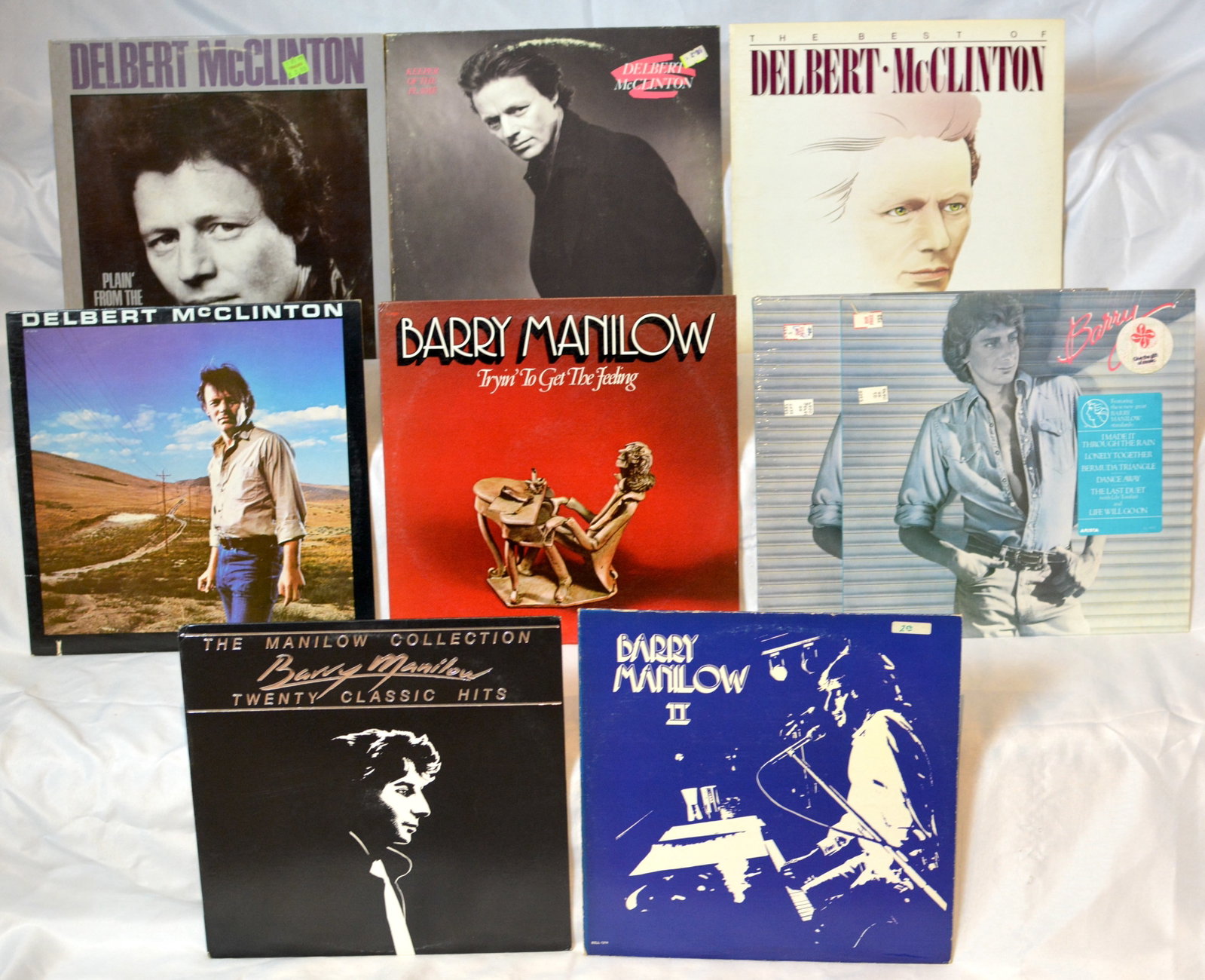 Vintage Delbert McClinton & Barry Manilow Vinyl LP Lot ? Greatest Hits, Soft Rock, Pop Records: Vintage vinyl LP lot featuring albums from Delbert McClinton and Barry Manilow. Nice mix of country rock, blues rock, adult contemporary, and classic pop from two well-known artists of the 1970s and 1