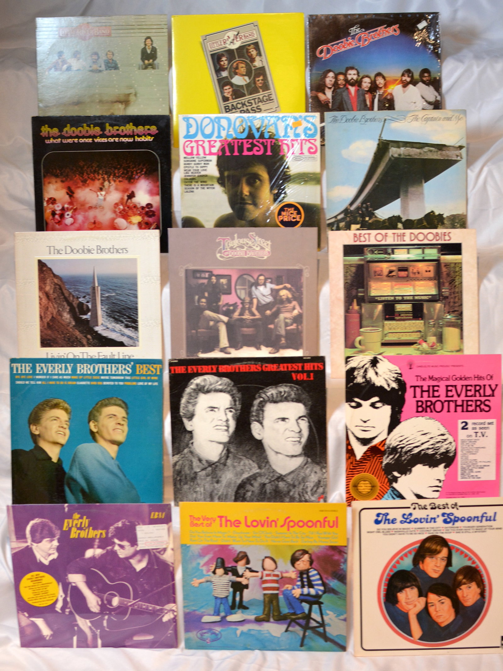 Classic Rock & Pop Vinyl Record Lot Doobie Brothers, Everly Brothers, Lovin Spoonful LP: Mixed vintage vinyl LP collection featuring classic rock, folk rock, and pop favorites from The Doobie Brothers, Everly Brothers, and The Lovin? Spoonful. Great starter lot for collectors or fans of 1