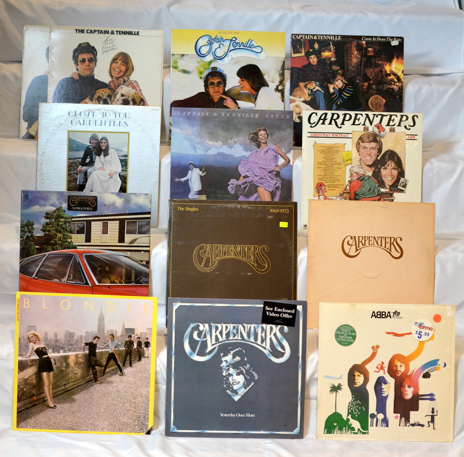Vintage Vinyl Record Lot-Carpenters, Captain & Tennille, Blondie & ABBA LP Collection: Mixed vintage vinyl LP collection featuring soft rock, pop, and easy listening favorites from the 1970s?1980s. Great assortment for collectors, nostalgic listeners, or resale inventory.Featured artist