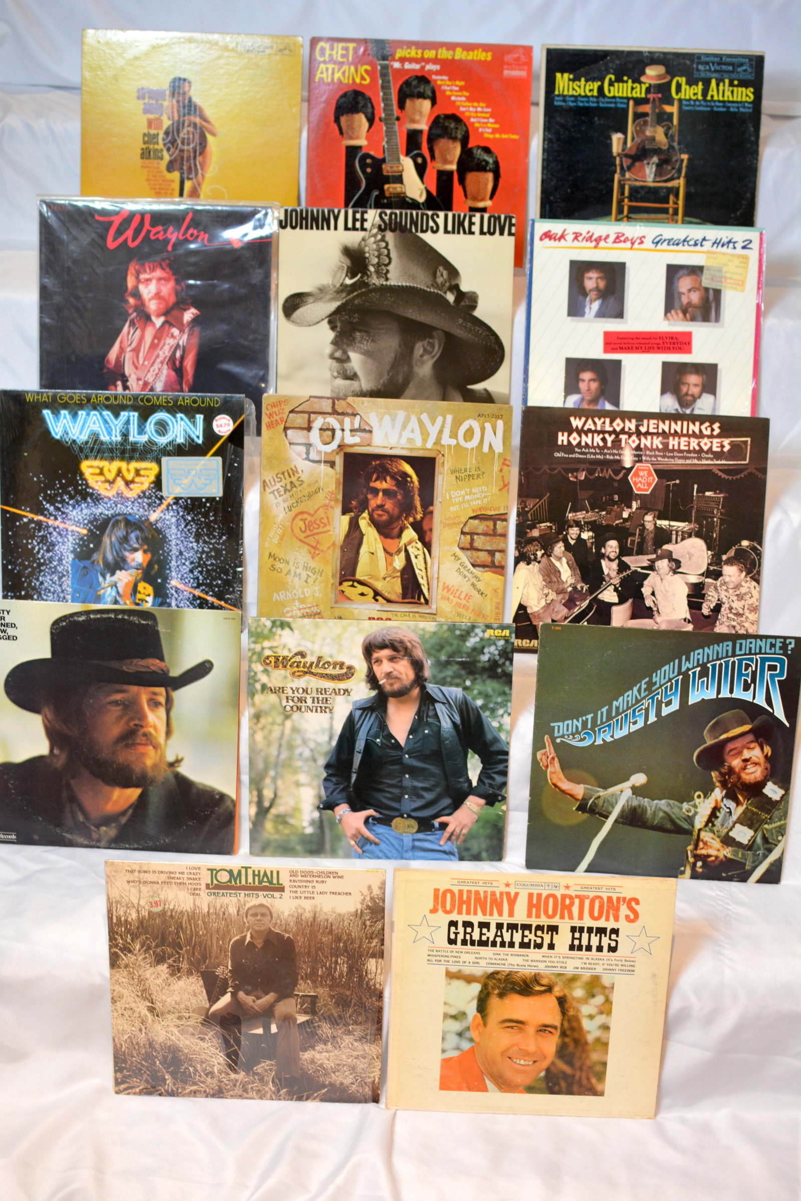 Vintage Country & Guitar Vinyl LP Lot Waylon Jennings, Chet Atkins, Rusty Wier & More: Large mixed vintage country and guitar-focused vinyl LP collection featuring outlaw country, classic country, country-rock, and instrumental guitar favorites. Excellent assortment for collectors, rese