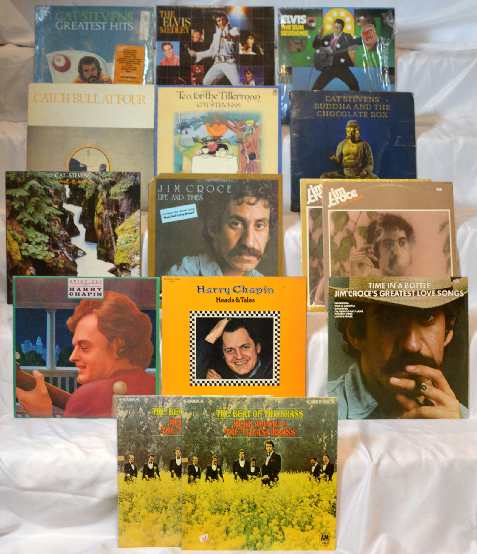 Classic Folk & Singer-Songwriter Vinyl LP Collection ? Cat Stevens, Jim Croce, Harry Chapin, Elvis &: Vintage vinyl LP collection featuring folk rock, singer-songwriter classics, soft rock favorites, and pop compilations from the 1960s?1980s. Nice mix of well-known artists and collectible listening ti