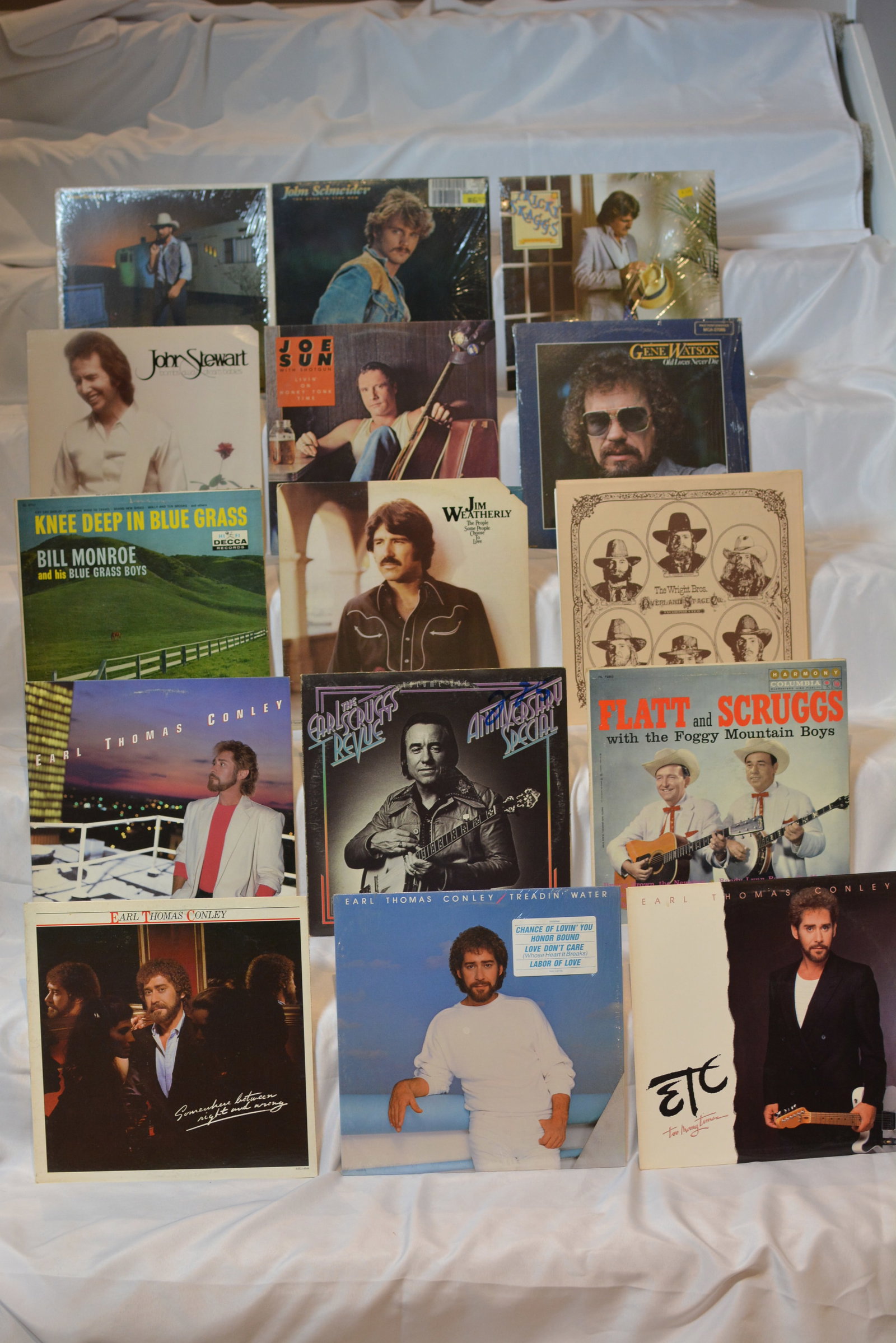 Country & Bluegrass Vinyl LP Collection ? Earl Thomas Conley, Flatt & Scruggs, Bill Monroe, John: Vintage vinyl LP collection featuring country, bluegrass, folk-country, and country-pop artists from the 1960s through the 1980s. Nice mix of traditional bluegrass legends and modern country favorites