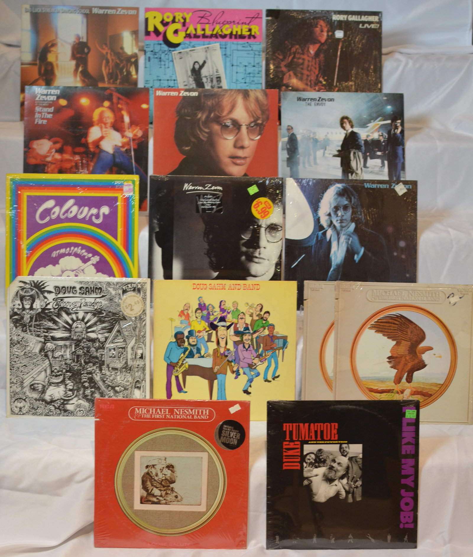 Vintage Rock & Country Rock Vinyl LP Lot ? Warren Zevon, Rory Gallagher, Michael Nesmith & More: Assorted vintage vinyl LP collection featuring classic rock, blues rock, country rock, and Americana artists from the 1970s and 1980s.Artists/titles visible include:Warren Zevon ? multiple albums incl