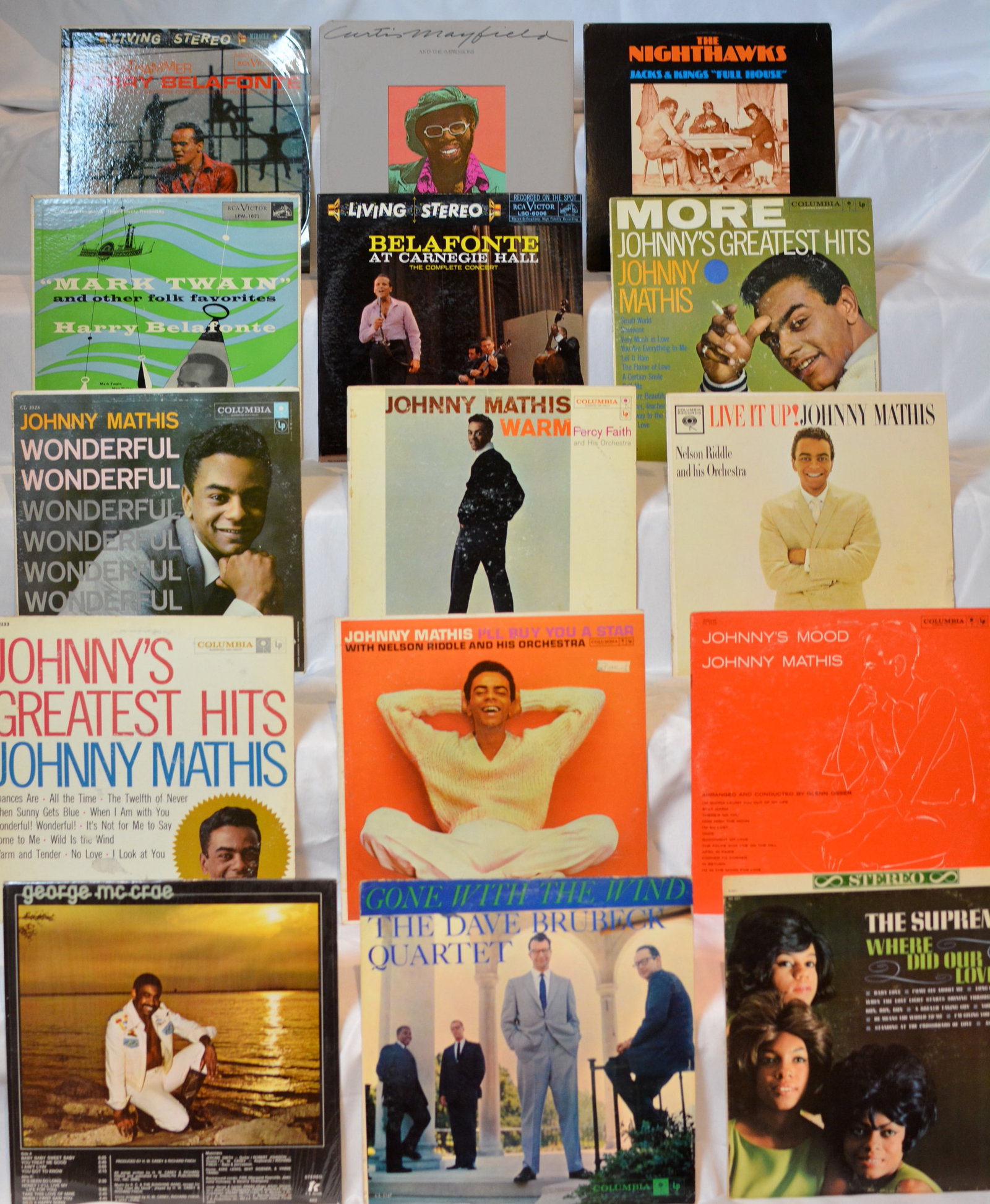Vintage Vinyl LP Record Lot ? Johnny Mathis, Harry Belafonte, Curtis Mayfield, Dave Brubeck &: Mixed lot of vintage vinyl LP records featuring classic pop, soul, jazz, folk, and easy listening artists from the 1950s?1980s.Artists/titles visible include:Johnny Mathis ? Johnny?s Greatest Hits, Wo
