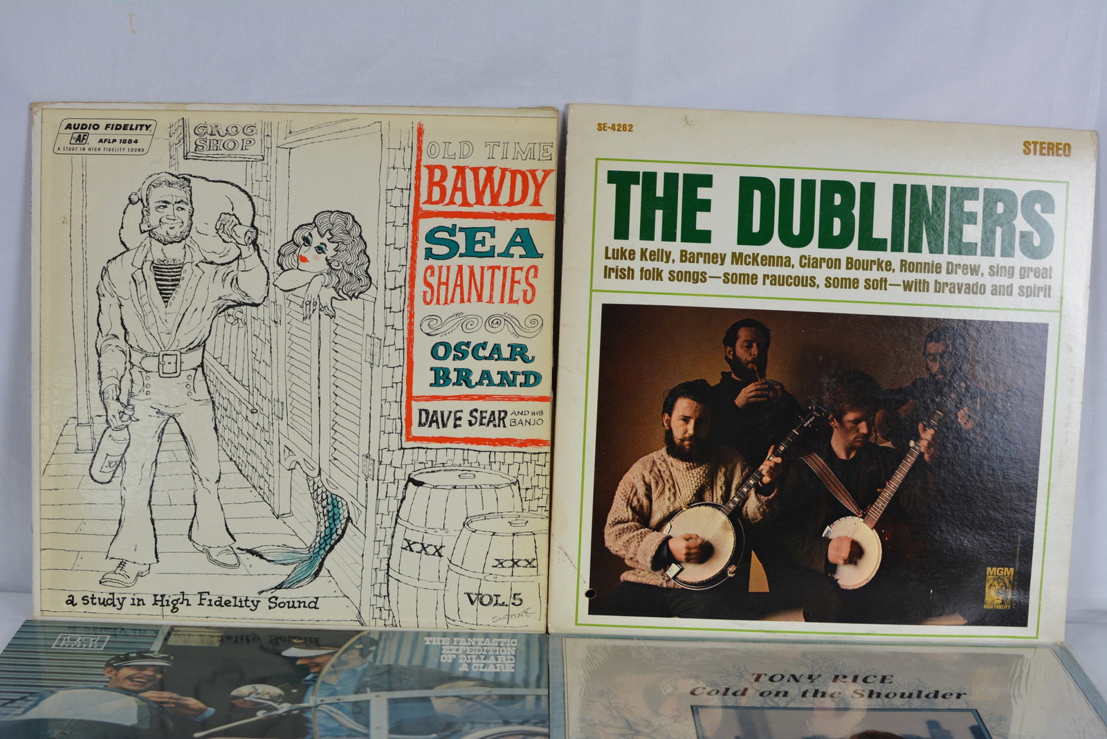 Vintage Folk & Irish Music Vinyl Record Lot The Dubliners, Sea Shanties, Tony Rice & More: Small mixed lot of vintage folk, Irish, and traditional music LP records featuring classic folk artists and sea shanty recordings. Visible titles/artists include: The Dubliners Irish folk songs LP Old