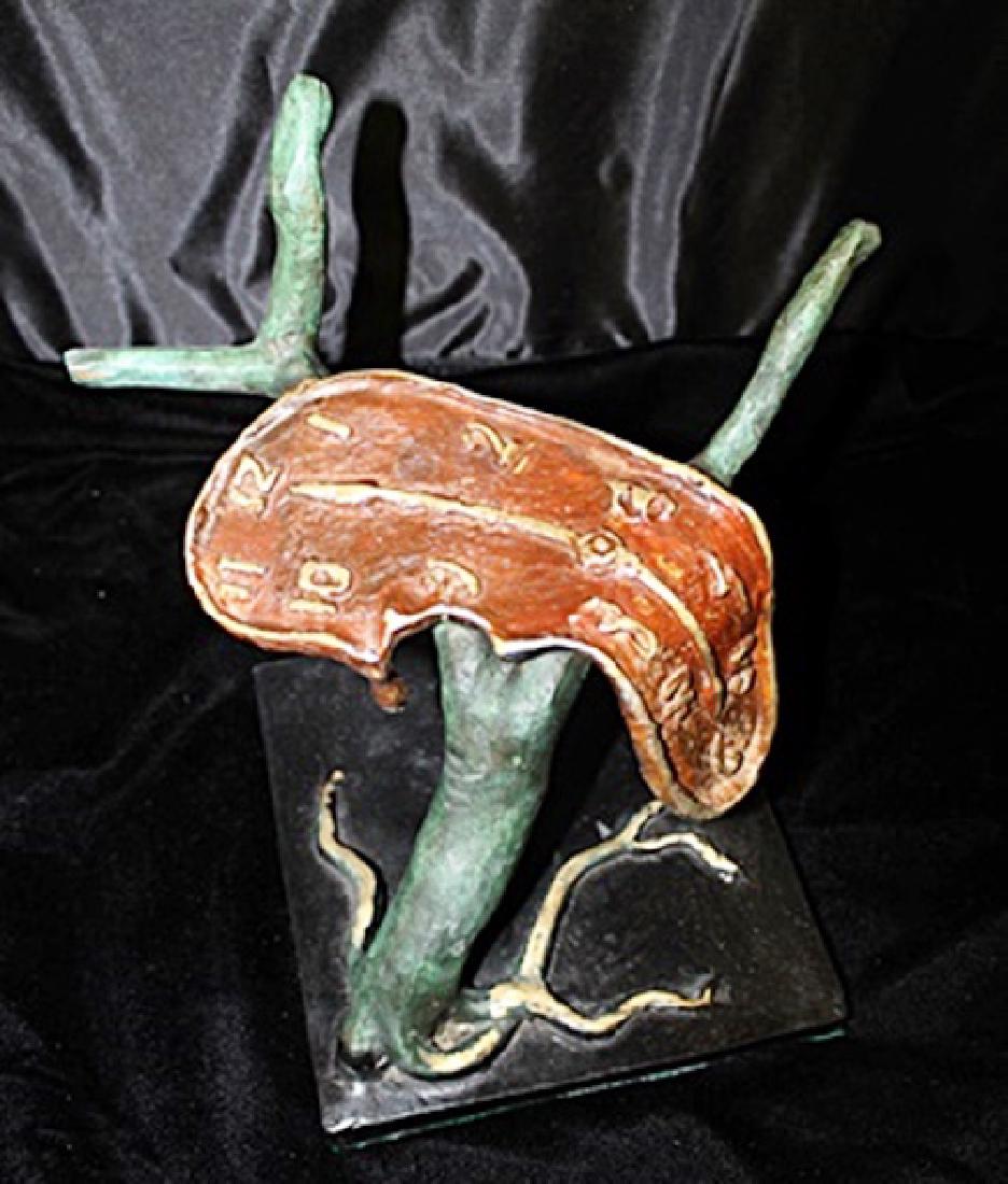 Signed Limited Edition Bronze Dali: Old recast patina bronze sculpture Salvador Dali, bearing a signature in a limited edition. Dimensions approx 19 x 9 x 5.