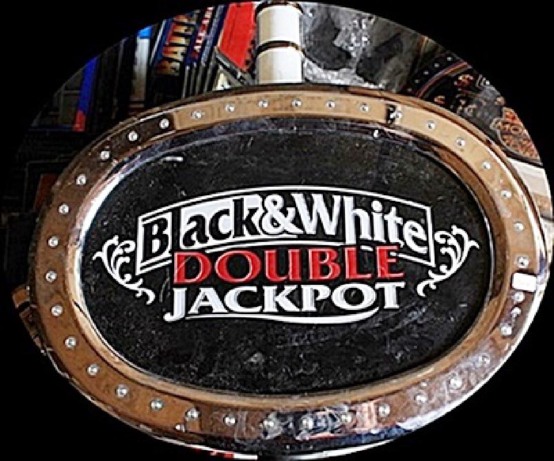 Vintage "Black & White" Double Jackpot Casino Slots: Attributed to: "Black & White" Casino Tops for Slot Machines. Approx 13 x 18 x 5 in.