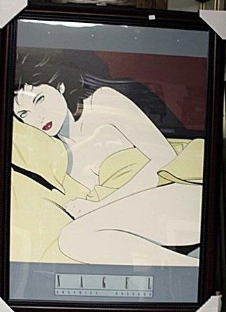 Framed By Patrick Nagel-Yellow Blanket (24FO): Framed Patrick Nagel-Yellow Blanket approx. 40"x28" His minimalist style defined an era with cool, seductive women that became the most iconic of any single generation. His elegant graphic work and hi