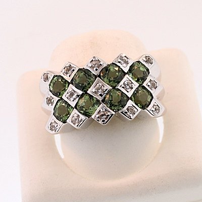 SILVER RING WITH GREEN TOURMALINE AND WHITE ZIRCON: Stone : GREEN TOURMALINE Metal : SILVER Cts: 2.00 Finish : POLISHED shape : RD Gmwt: 5.00 color: GREEN Size: 8