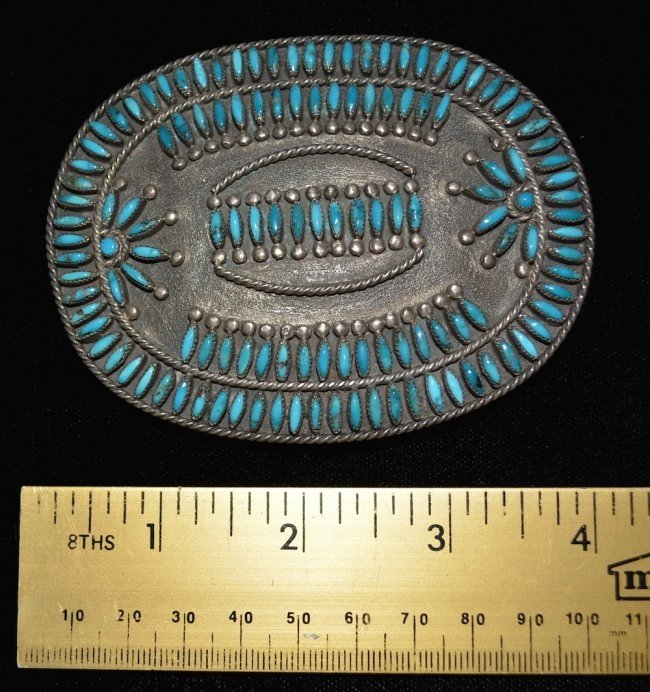 Zuni Belt Buckle: Cluster Needlepoint Buckle, Treated Kingman Turquoise, Sterling Silver, from Herder's Boy 11/2/1968, circa 1960. Hallmarked: SM Bahe, 2 Stones Missing