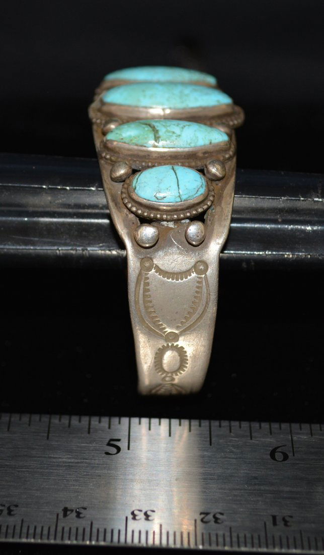 Navajo Turquoise Bracelet: Bracelet, Navajo made, Commercial Bezel, Polyston Nevada Turquoise, Sterling Silver, Hallmarked (Charles Long?) from Annie Poorman 5/28/1970, circa 1965