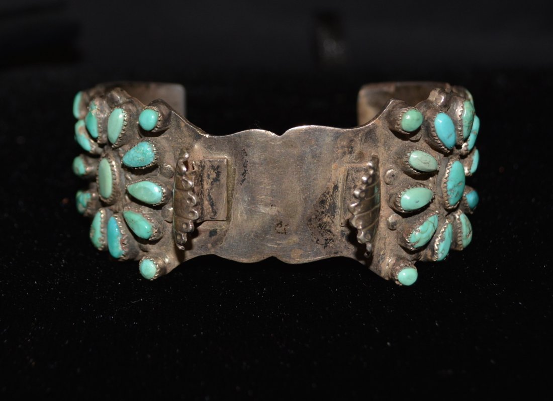 Zuni Watch Band: Ladies Watch Bracelet, Zuni Petite Point, Mostly Morenci Turquoise, Sterling Silver, from Clarence Begay 5/19/1975, circa 1960. Note: Hallmarked "F.M.B." A Member of Victor M Begay Family, Navajo