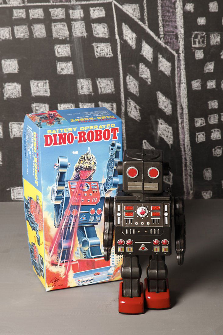 Japon Battery toy annees 1960 Horikawa Metamorph Dino: Boite reedition Battery toy, not original box, working, oxidations H. 29 cm Yukio Shimizu, Teruhisa Kitahara Robots. Spaceships and other Tin Toys, Taschen illustre p. 178 - 179