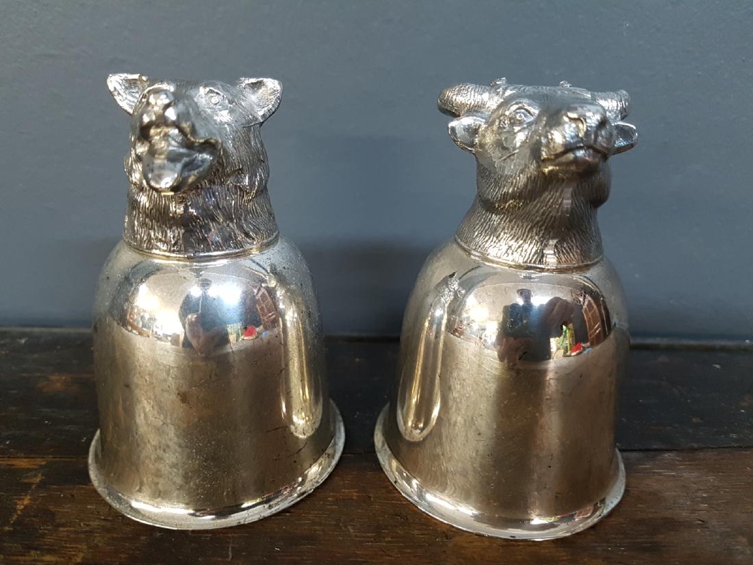 Lot of Two Stirrup Cups Pacific Silver Plate: Lot of Two Stirrup Cups Pacific Silver Plate One Ox and one Dog Engraving on back 3.5" tall