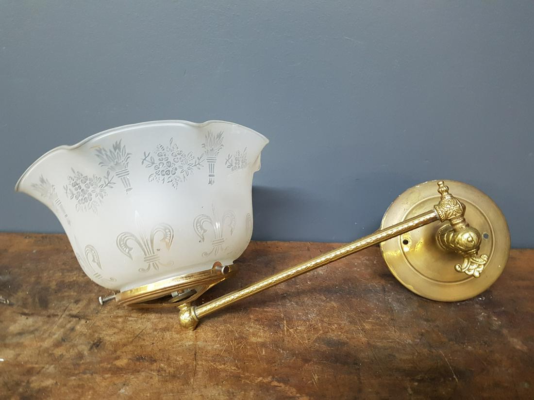 Articulated Brass Wall Sconce With Frosted Shade: Articulated Brass Wall Sconce With Frosted Shade Arm Measures 12 Inches, Shade Measures 8 Inches Diameter