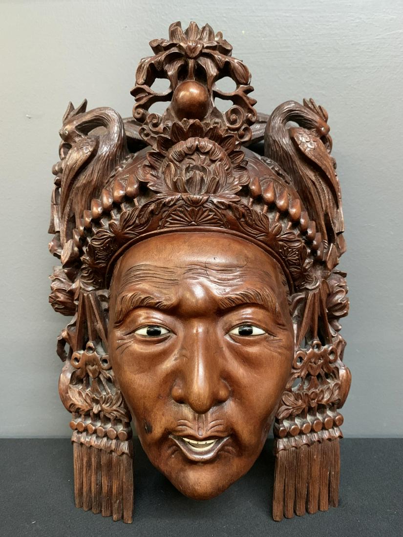 Chinese Carved Hard Wood Redwood Mask: Chinese Ornately Carved Hard Wood Redwood Mask of a Man, Glass Eyes. 12 x 8 x 5 inches.