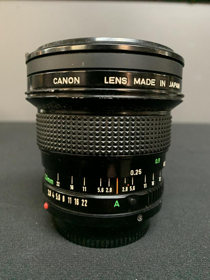 Canon Lens FD 20mm 1:2.8 Hoya 72mm UV Filter: Canon FD 20mm 1:2.8 Wide Angle Lens with Hoya 72mm UV Filter, Skylight [1B]. Serial number Z603. With original lens caps.
