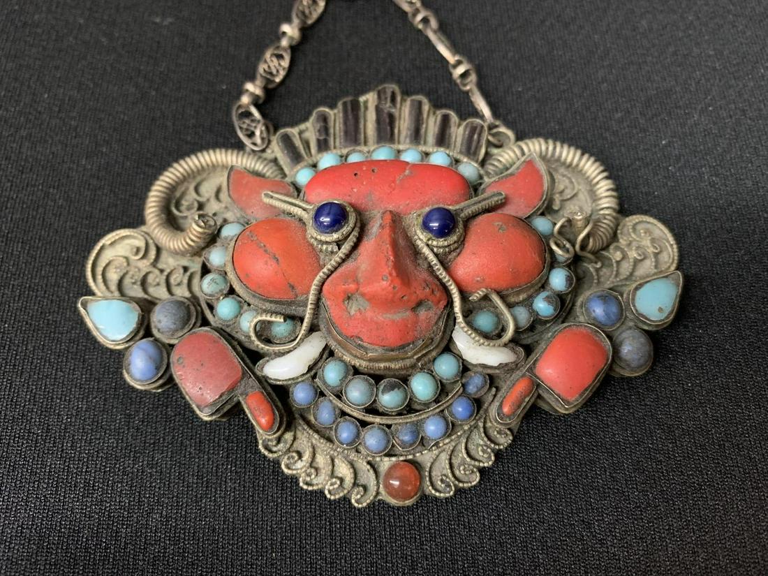 Glass And Precious Stone Inlaid Silver Necklace: Glass And Precious Stone Inlaid Silver (?) Amulet, Necklace. Possibly From Nepal. Amulet Measures 4 X 3 Inches. Necklace Measures Approximately 22 Inches Around..