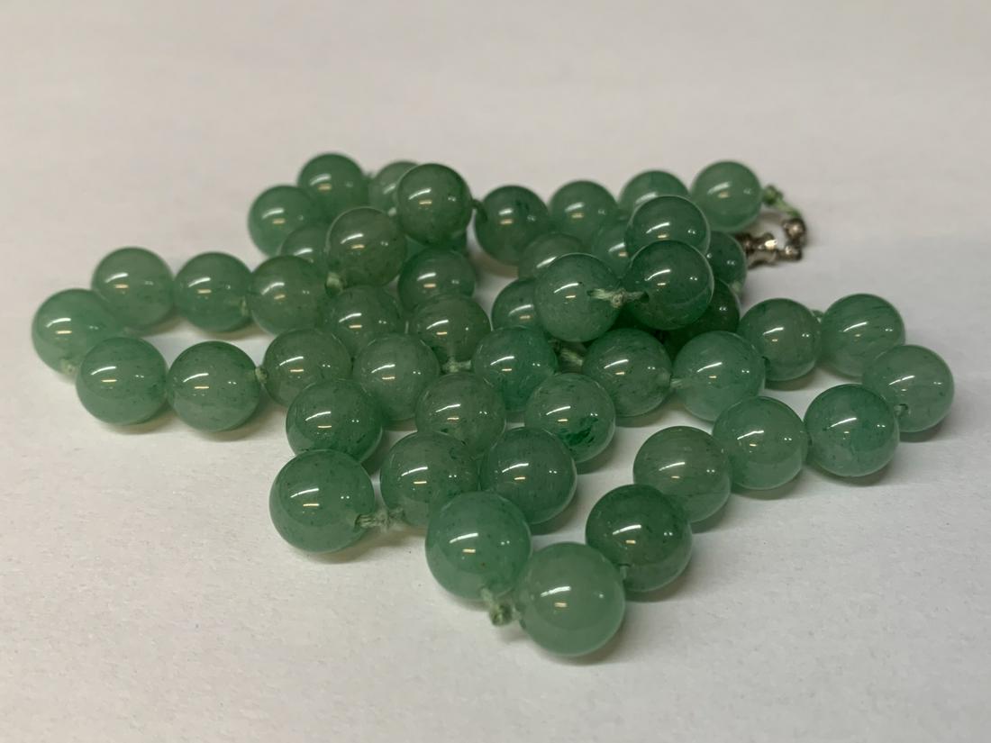 Chnese Light Green Jade Beaded Necklace: Chnese Light Green Jade Beaded Necklace. Measures 24 Inches. Keywords: Chinese, Chinese Antiques, Asian, Asian Art, Asian Antiques, Chinese Jade, Jade, Chinese Porcelain, Blue and White, Blue de Hue,