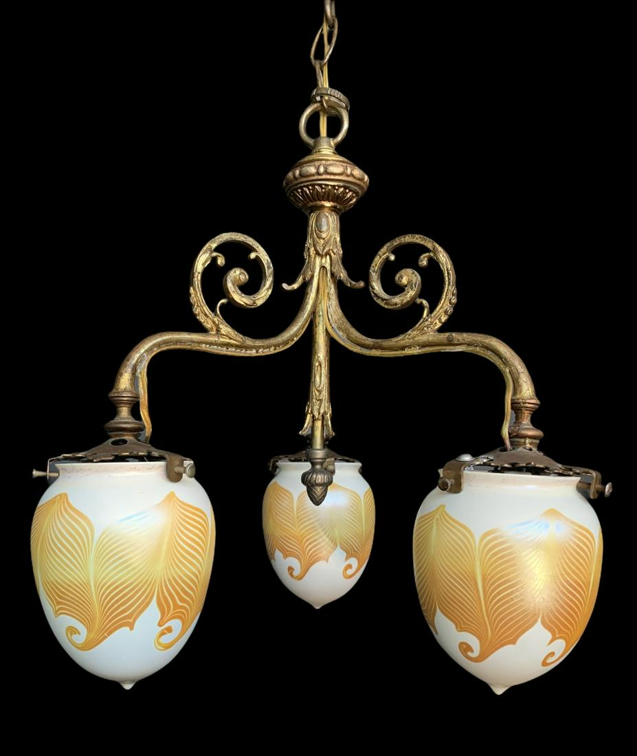 Quezal Shade Bronze Chandelier: Quezal Pulled Feather Art Glass Shade Bronze Chandelier. Shades: 3 1/4" opening, 5"h. No condition issues.