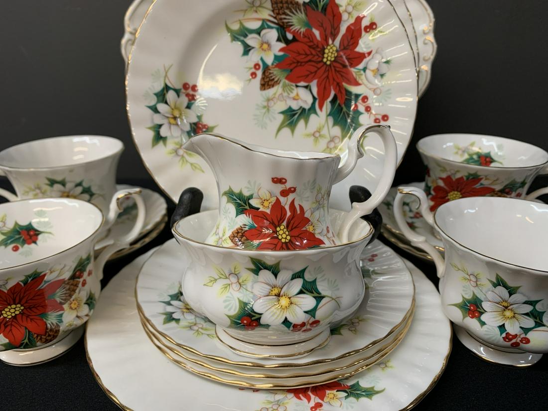 Lot Royal Albert Bone China Poinsettia Tea Cups: Lot Of 17 Pieces Royal Albert Bone China Poinsettia Pattern Tea Cup, Saucers, Dessert Plates, 2 Serving Plates, Sugar Bowl, Creamer