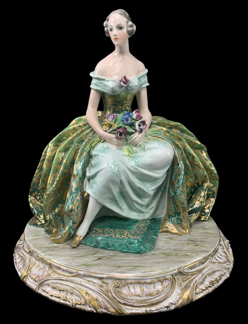 Large Guido Cacciapuoti Italy Seated Lady Figurine: Large Guido Cacciapuoti Italy Seated Lady Figurine. 14.5 H X 14.5 X 12 Inches.