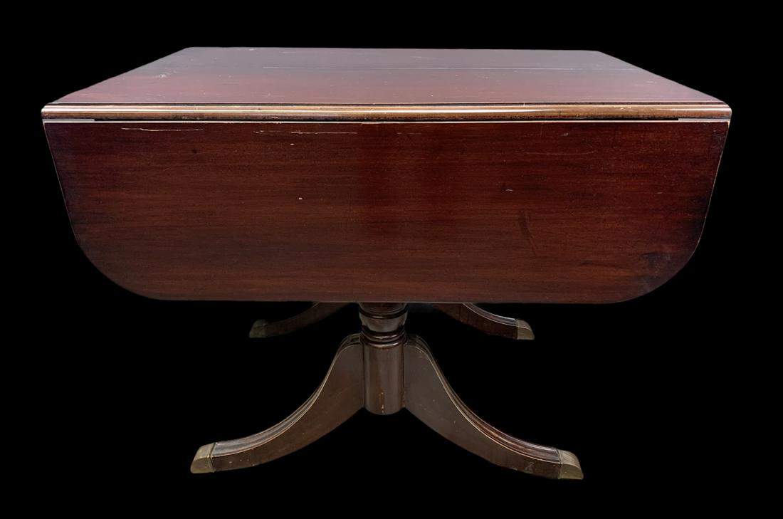 Duncan Phyfe Style Mahogany Drop Leaf Dining Table: Duncan Phyfe Style Mahogany Drop Leaf Dining Table. Missing Leaves. 28 X 48 L X 29.5 H Inches.