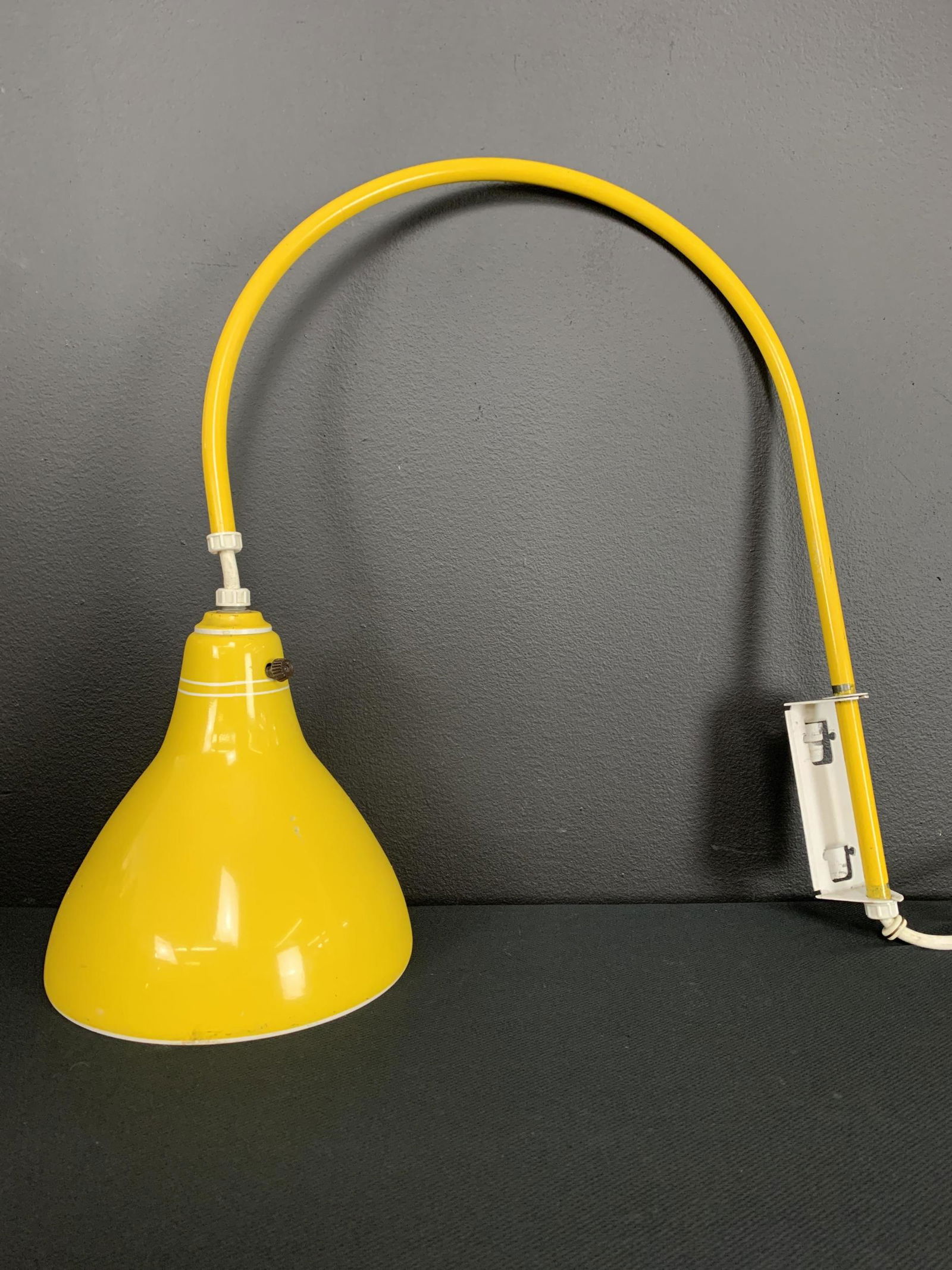 mid century yellow metal arc wall task lamp (1 of 5)