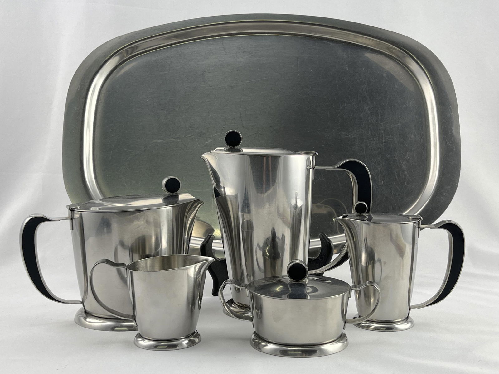 1960s Gense Sweden Stainless Coffee Tea Set: 1960s Gense Sweden Mid Century Modern Stainless Coffee Tea Set Folke Arstrom. Tray measures 19 x 12 inches. Set comprised of tea pot, coffee pot, creamer and milk pitcher, sugar bowl.