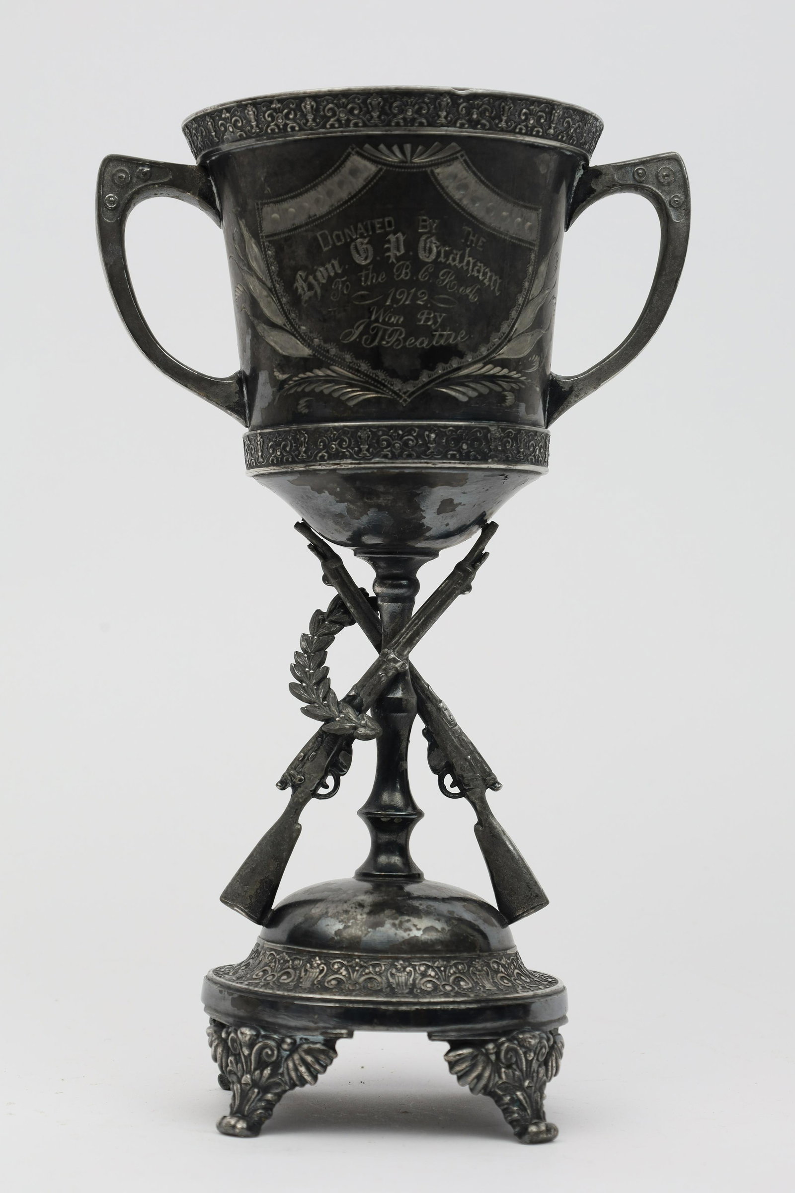 1912 British Columbia Rifle Assoc. Bcra Trophy: 1912 British Columbia Rifle Assoc. Bcra Trophy. Donated By Hon. G.p. Graham To The Bcra 1912 Won By J.t. Beattie. 10.5 Inches H X 6.5 W. Trophy Made By The Toronto S.p. Company.