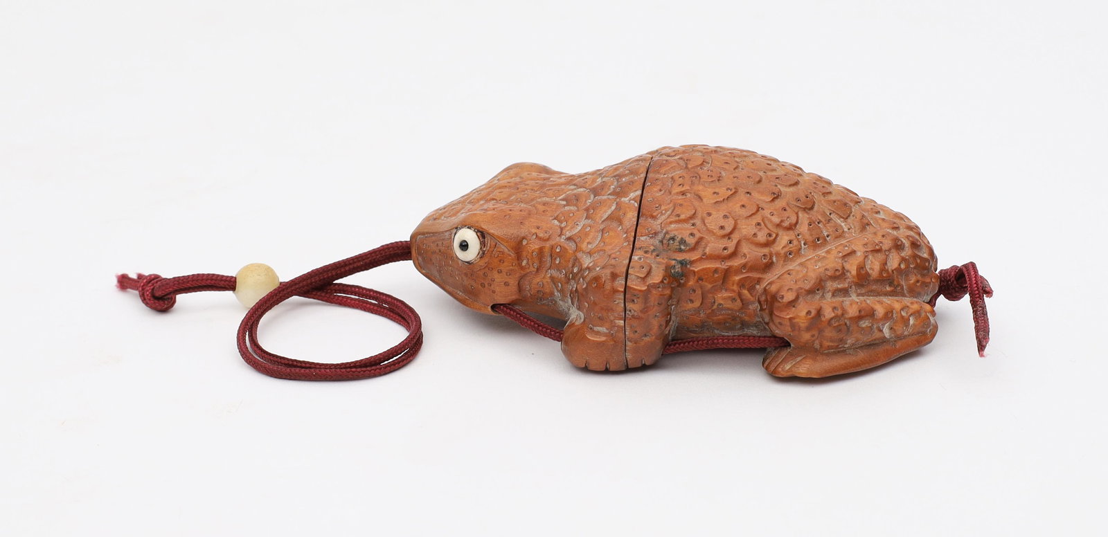 Signed Japanese Frog Inro: Signed Japanese Frog 2 Part Inro. Wood Carved Frog With Inlaid Eyes. Signed On Belly. 3.25 X 2.25 X 1 Inches H.